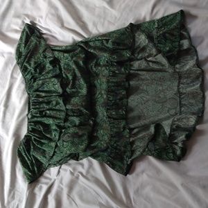 A dark green off the shoulder dress